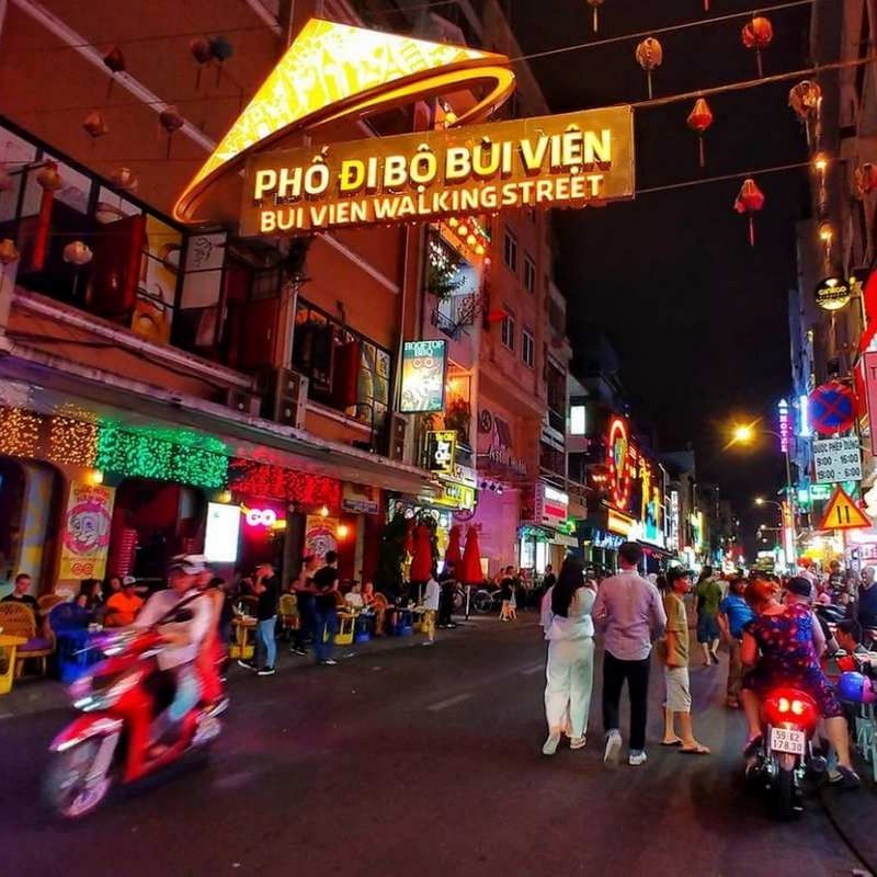 Saigon Night Motorbike Tour – Food Beer and Live Music Experience 4 Hours